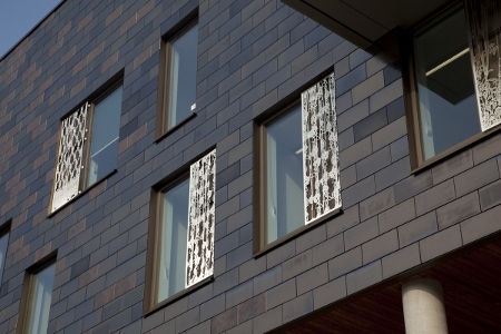 The exterior screens have several benefits, including enhancing privacy and dignity and doubling up as ventilation panels