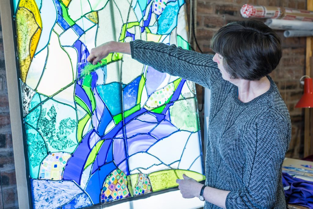 Stained-glass windows, musical installations, and artwork bring the building to life