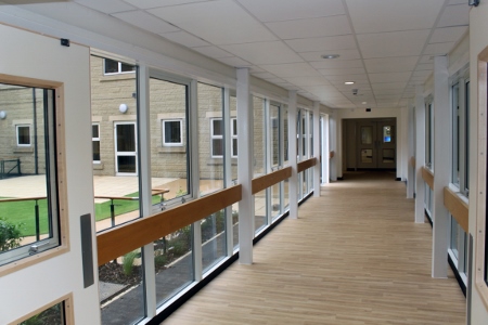 Corridors on the unit are wide and provide views to the outside