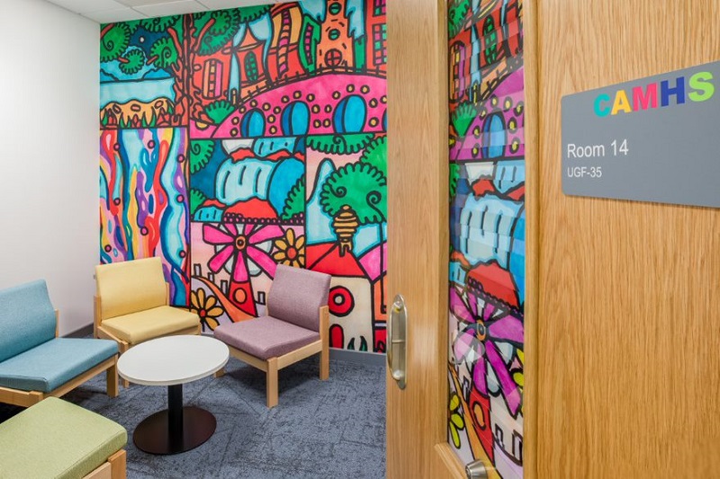Each room has a graphical image depicting its theme on the door and a unique design on the walls, which were chosen by the young people the service supports