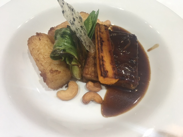 The vegetarian main course option is Malaysian red pepper tofu