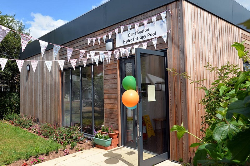 Larch wood was used to help the building blend in with its surroundings