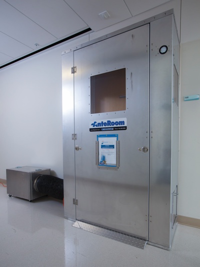 The Hepacart AnteRoom unit magnetically seals to a doorframe to provide a secondary vestibule to keep dust and pathogens out of patient areas