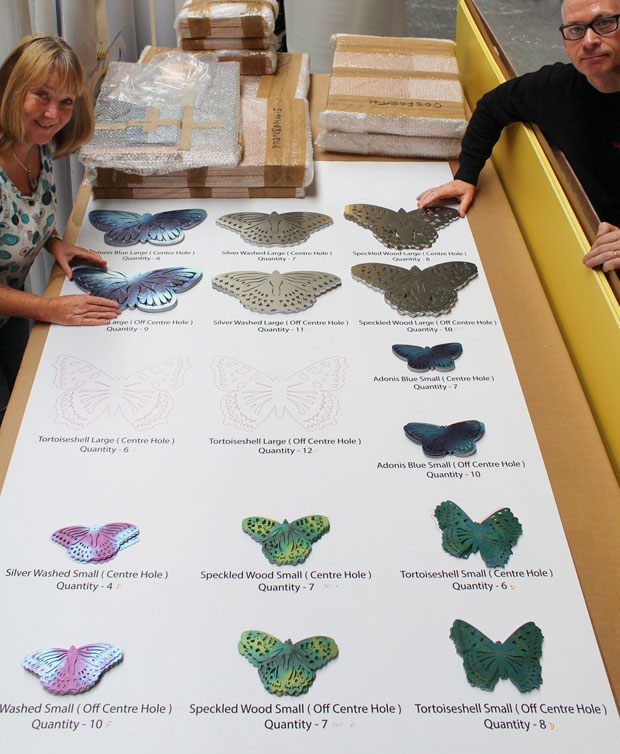 Each butterfly is individually coloured and lacquered