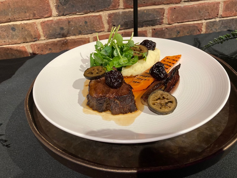 The meat main course is slow-cooked glazed beef cheek