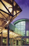 White floodlighting projected to the outside of a building generates a safe and friendly environment
