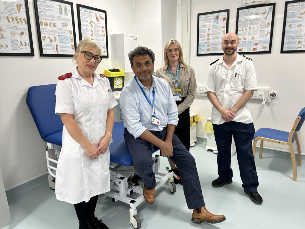 Staff in one of the orthopaedic clinics. From left – Healthcare Support Worker Susan Dobbs, Orthopaedic Consultant Vikas Sharma, Clinical Service Manager Carly Hicks and Staff Nurse Steven Meadows