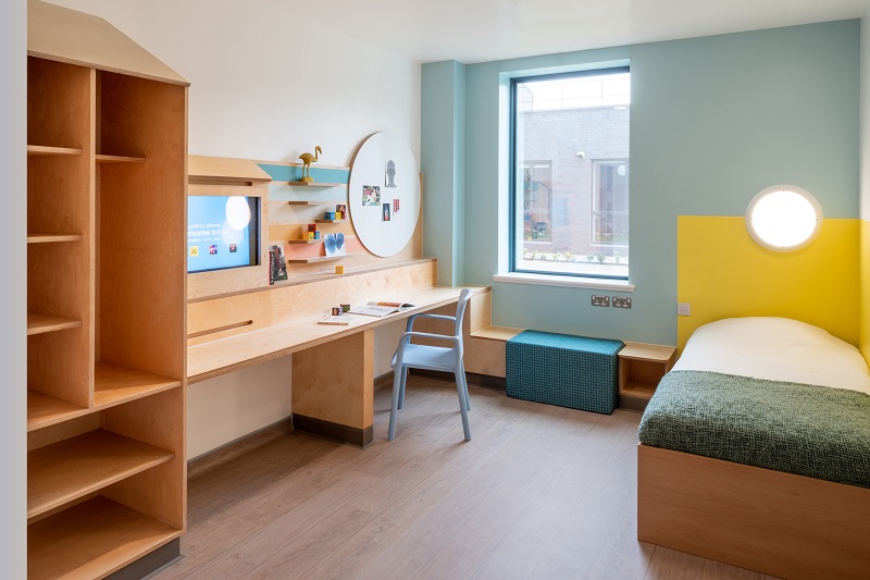 The bedrooms feature a unique ottoman which doubles as a window seat and is designed to make conversations between service users and parents less awkward and unnatural